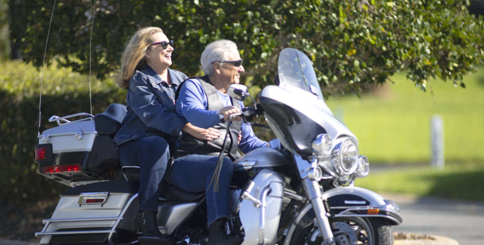 Couple riding their motorcycle