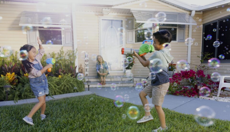 Kids playing with bubbles