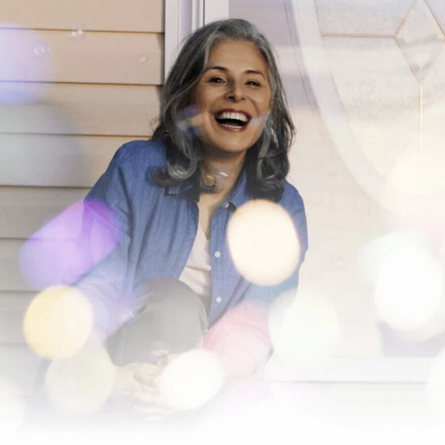 Happy mother with home